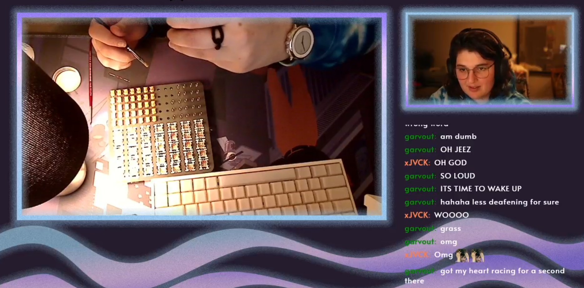 A stream screencap of a brunette woman wearing headphones and building mechanical keyboards.